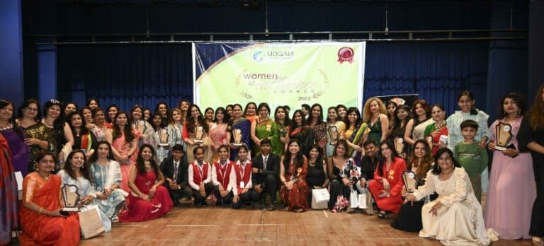 Group photo of honourees on stage at the Women of Influence Awards